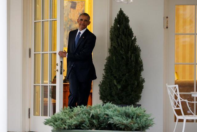 US President Barack Obama departs the Oval Office for the final time as sitting president, at the White House in Washington. (REUTERS) US President Barack Obama departs the Oval Office for the final time as sitting president, at the White House in Washington. (REUTERS)