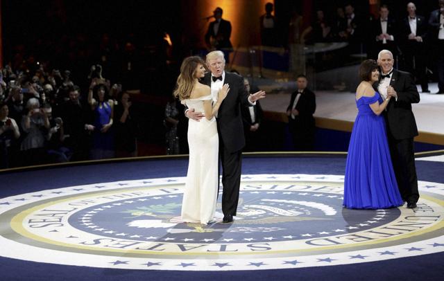 American President Donald J Trump dances with his wife, First Lady Melania Trump, at The Salute To Our Armed Services Inaugural Ball in Washington on Friday. (AP) American President Donald J Trump dances with his wife, First Lady Melania Trump, at The Salute To Our Armed Services Inaugural Ball in Washington on Friday. (AP)