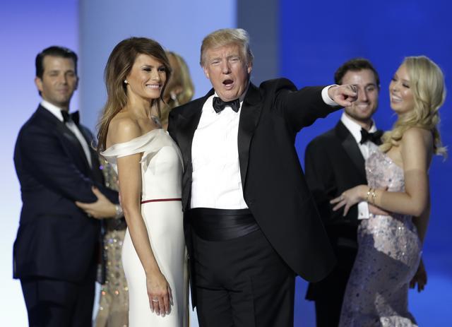 US President Donald Trump acknowledges the crowd at the Freedom Ball in Washington, on Friday. (AP Photo)