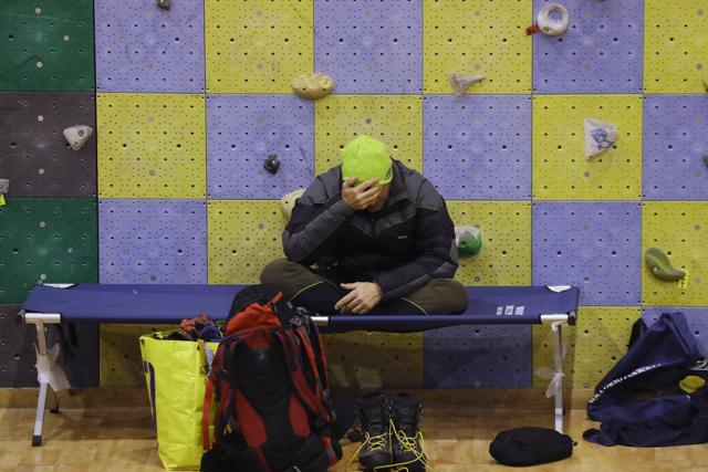 A rescuer rests in a sports palace turned into a coordination centre, in Penne, central Italy, early Saturday. Rescuers listened for signs on Saturday of any more survivors, three days after an avalanche slammed into a resort hotel in Italy's central Apennines mountains. (AP Photo) A rescuer rests in a sports palace turned into a coordination centre, in Penne, central Italy, early Saturday. Rescuers listened for signs on Saturday of any more survivors, three days after an avalanche slammed into a resort hotel in Italy's central Apennines mountains. (AP Photo)
