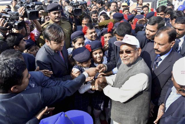 Bihar chief minister meets school students after making a massive human chain against alcoholism and other addictions at Gandhi Maidan in Patna. (PTI Photo) Bihar chief minister meets school students after making a massive human chain against alcoholism and other addictions at Gandhi Maidan in Patna. (PTI Photo)