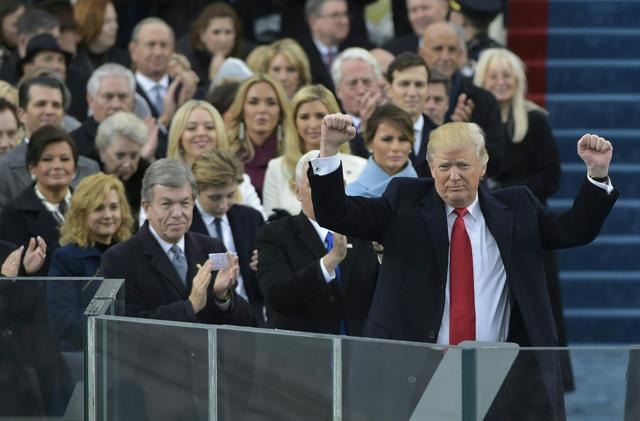 US President Donald Trump acknowledges the crowd during his swearing-in ceremony on at the US Capitol in Washington, DC. (AFP Photo) US President Donald Trump acknowledges the crowd during his swearing-in ceremony on at the US Capitol in Washington, DC. (AFP Photo)