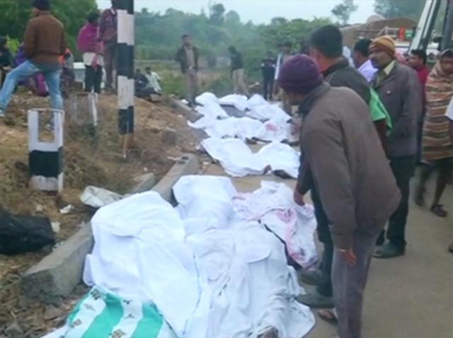Bodies covered with white sheets are laid out after coaches of a Hirakhand express train from Jagdalpur to Bhubaneswar derailed near Kuneri station. (REUTERS)