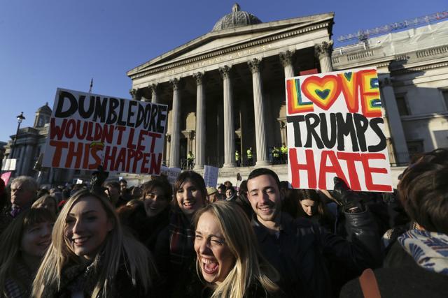 Demonstrators take part in the Women's March in Trafalgar Square, central London. The march is being held in solidarity with the Women's March in Washington. (AP Photo) Demonstrators take part in the Women's March in Trafalgar Square, central London. The march is being held in solidarity with the Women's March in Washington. (AP Photo)