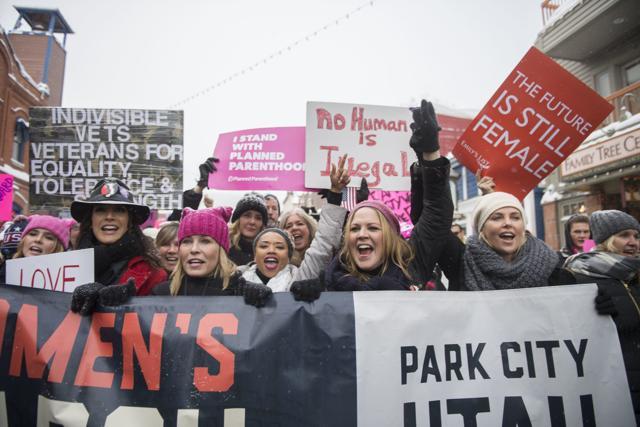 Actresses Chelsea Handler and Charlize Theron participate in the "Women's March On Main" during the 2017 Sundance Film Festival on Saturday, Jan 21 , in Park City, Utah. (Arthur Mola/Invision/AP) Actresses Chelsea Handler and Charlize Theron participate in the "Women's March On Main" during the 2017 Sundance Film Festival on Saturday, Jan 21 , in Park City, Utah. (Arthur Mola/Invision/AP)