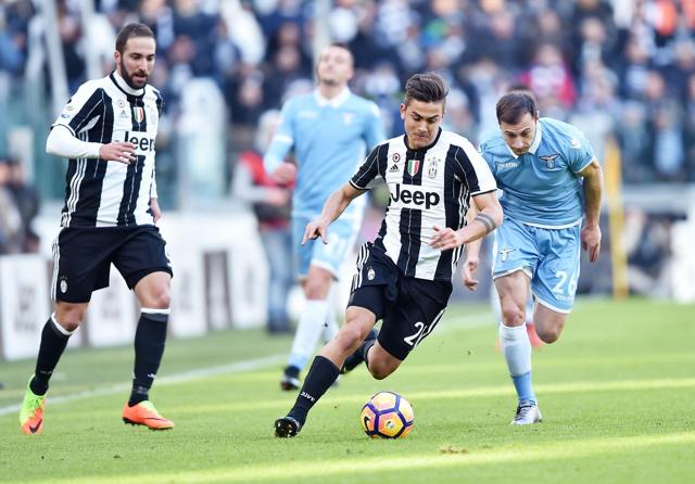 Juventus' Paulo Dybala runs with the ball during a Serie A match between Juventus FC and Lazio FC. (AP) Juventus' Paulo Dybala runs with the ball during a Serie A match between Juventus FC and Lazio FC. (AP)