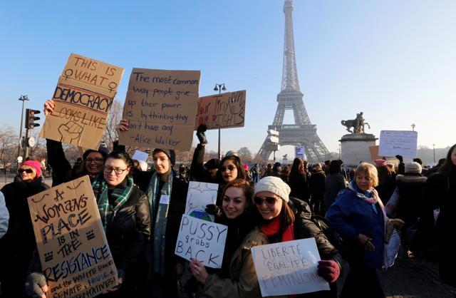 Protesters take part in the Women's March in Paris, France, January 21. (REUTERS) Protesters take part in the Women's March in Paris, France, January 21. (REUTERS)