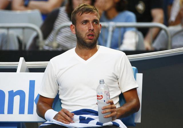 Daniel Evans sits during his Men's singles fourth round match against France's Jo-Wilfried Tsonga. (REUTERS) Daniel Evans sits during his Men's singles fourth round match against France's Jo-Wilfried Tsonga. (REUTERS)