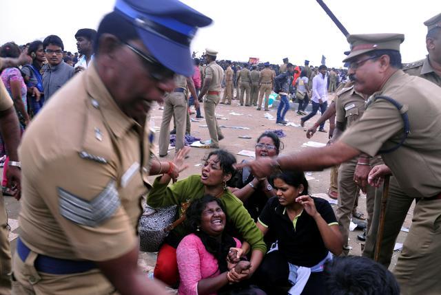 Police remove demonstrators from Marina beach during a protest demanding a permanent solution to ensure the unhindered conduct of Jallikattu, a traditional bull-taming contest, in Chennai. (REUTERS) Police remove demonstrators from Marina beach during a protest demanding a permanent solution to ensure the unhindered conduct of Jallikattu, a traditional bull-taming contest, in Chennai. (REUTERS)