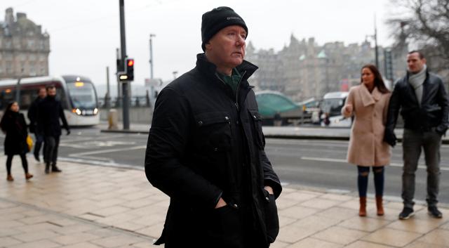 Scottish author Irvine Welsh walks along Princes Street as he leaves an interview with Reuters ahead of the premiere of the film T2 Trainspotting in Edinburgh. (REUTERS) Scottish author Irvine Welsh walks along Princes Street as he leaves an interview with Reuters ahead of the premiere of the film T2 Trainspotting in Edinburgh. (REUTERS)