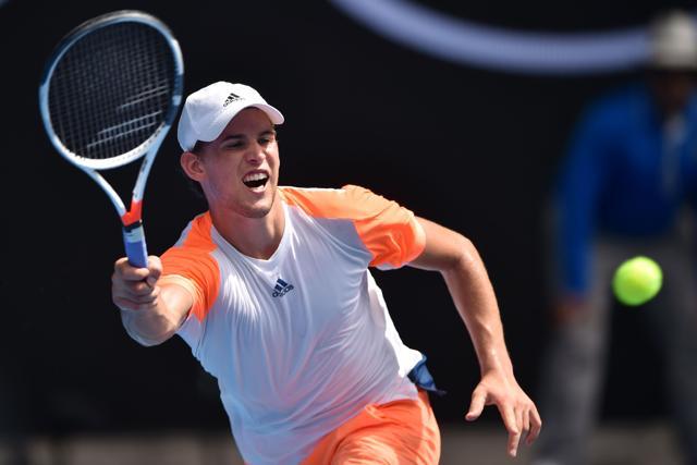 Austria's Dominic Thiem hits a return against Belgium's David Goffin during their men's singles fourth round match on day eight of the Australian Open. (AFP) Austria's Dominic Thiem hits a return against Belgium's David Goffin during their men's singles fourth round match on day eight of the Australian Open. (AFP)