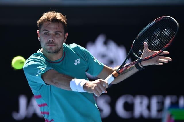 Switzerland's Stanislas Wawrinka hits a return against Italy's Andreas Seppi during their men's singles fourth round match on day seven of the Australian Open. (AFP) Switzerland's Stanislas Wawrinka hits a return against Italy's Andreas Seppi during their men's singles fourth round match on day seven of the Australian Open. (AFP)