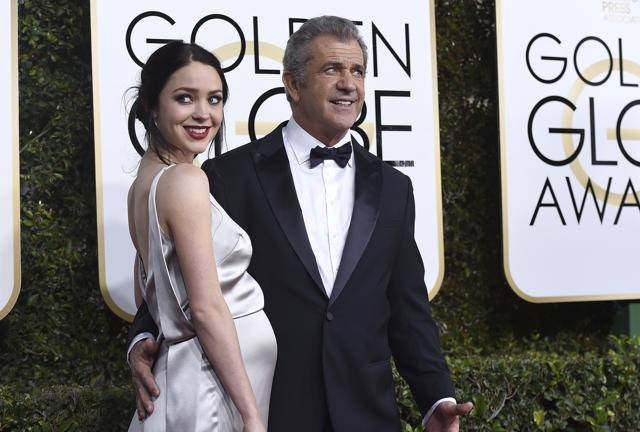 Rosalind Ross, left, and Mel Gibson arrive at the 74th annual Golden Globe Awards at the Beverly Hilton Hotel. (AP) Rosalind Ross, left, and Mel Gibson arrive at the 74th annual Golden Globe Awards at the Beverly Hilton Hotel. (AP)