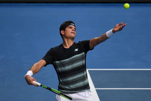 Canada's Milos Raonic serves against Spain's Roberto Bautista Agut during their men's singles fourth round match on day eight of the Australian Open. (AFP) Canada's Milos Raonic serves against Spain's Roberto Bautista Agut during their men's singles fourth round match on day eight of the Australian Open. (AFP)