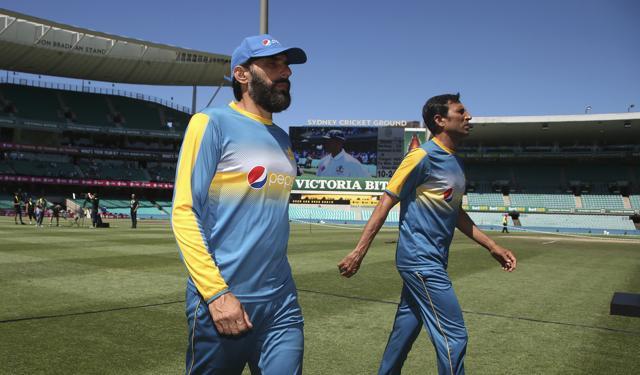 Pakistan's Misbah-ul-Haq, left, and Younis Khan make their war to the presentations after losing to Australian in their Ttest match in Sydney, on Jan. 7, 2017. Australia won match and the series 3-0. (AP) Pakistan's Misbah-ul-Haq, left, and Younis Khan make their war to the presentations after losing to Australian in their Ttest match in Sydney, on Jan. 7, 2017. Australia won match and the series 3-0. (AP)