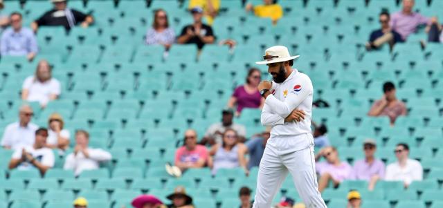 Misbah-ul-Haq reflects on the state of play against Australia on the fourth day of the third cricket Test match at the SCG, in Sydney on January 6, 2017. (AFP) Misbah-ul-Haq reflects on the state of play against Australia on the fourth day of the third cricket Test match at the SCG, in Sydney on January 6, 2017. (AFP)