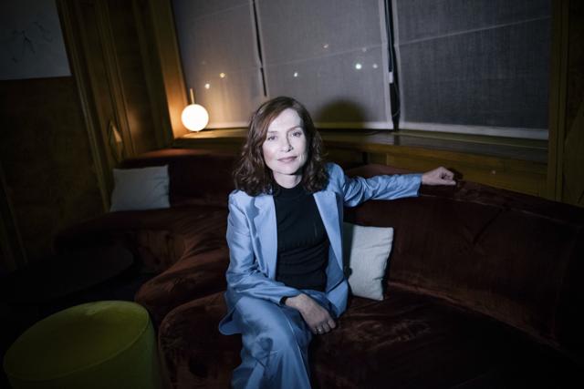 French actress Isabelle Huppert poses for photographer after an interview with the Associated Press in Paris, France. (AP) French actress Isabelle Huppert poses for photographer after an interview with the Associated Press in Paris, France. (AP)