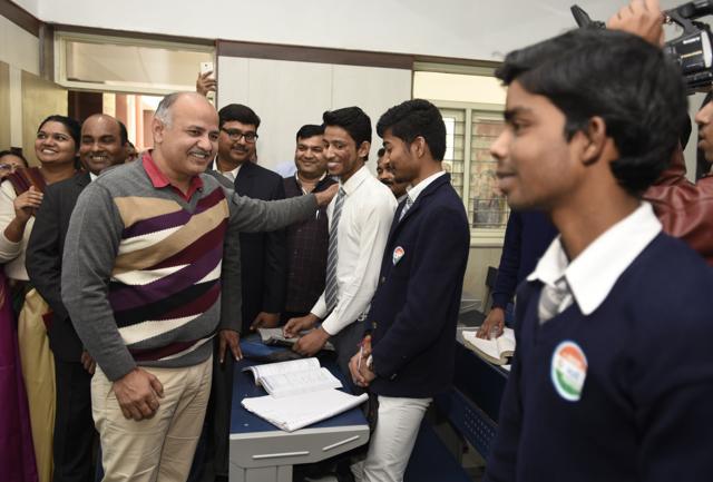 Delhi Deputy Chief Minister and Education Manish Sidodia with students of the first model school Sarvodaya Bal Vidyalaya at Rouse Avenue in New Delhi on Wednesday. (Sonu Mehta/Hindustan Times) Delhi Deputy Chief Minister and Education Manish Sidodia with students of the first model school Sarvodaya Bal Vidyalaya at Rouse Avenue in New Delhi on Wednesday. (Sonu Mehta/Hindustan Times)