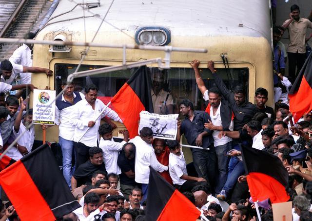Demonstrators hold a ‘Rail Roko’ protest against Jallikattu ban at the Chennai Egmore railway station in Chennai. (Reuters Photo) Demonstrators hold a ‘Rail Roko’ protest against Jallikattu ban at the Chennai Egmore railway station in Chennai. (Reuters Photo)