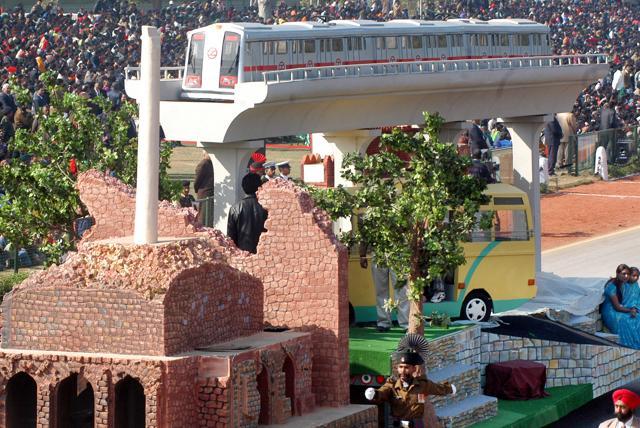 A model of the Delhi Metro along with CNG and replica of Feroz Shah Kotla ruins displaying the government’s stress on improvement of public transport system in 2006. (Ajay Aggarwal/HT Photo) A model of the Delhi Metro along with CNG and replica of Feroz Shah Kotla ruins displaying the government’s stress on improvement of public transport system in 2006. (Ajay Aggarwal/HT Photo)