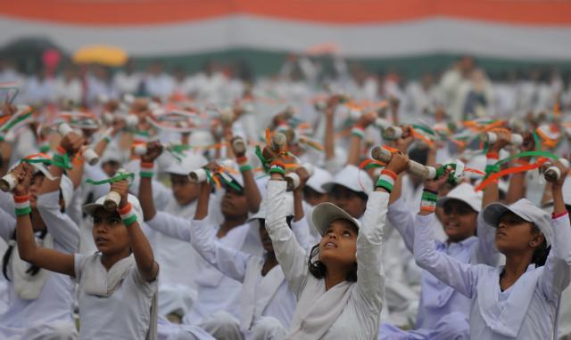 Student perform the dumbbell PT show during the 68th Republic Day celebration in Tau Devi Lal Stadium on Thursday. (Parveen Kumar/HT Photo) Student perform the dumbbell PT show during the 68th Republic Day celebration in Tau Devi Lal Stadium on Thursday. (Parveen Kumar/HT Photo)