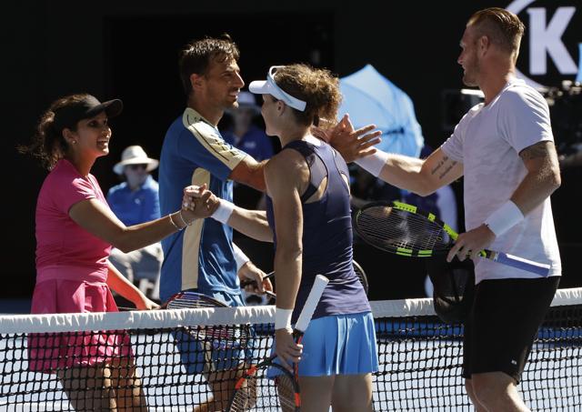 Sania Mirza (left) celebrates with Ivan Dodig (second left) of Croatia after winning their mixed doubles' semifinal against Australia's Samantha Stosur and Sam Groth in Melbourne on Friday. (AP) Sania Mirza (left) celebrates with Ivan Dodig (second left) of Croatia after winning their mixed doubles' semifinal against Australia's Samantha Stosur and Sam Groth in Melbourne on Friday. (AP)