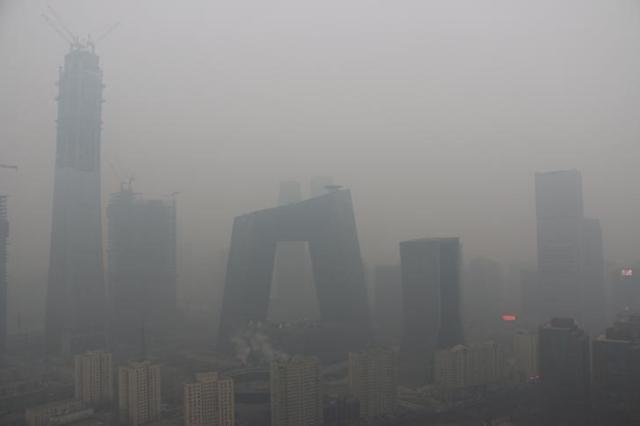 Smog in Beijing on Thursday resulted in a sharp drop in visibility. (Reuters) Smog in Beijing on Thursday resulted in a sharp drop in visibility. (Reuters)
