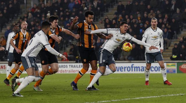 Chris Smalling and Paul Pogba were the stars for Manchester United F.C. in their tense match against Hull City. (REUTERS) Chris Smalling and Paul Pogba were the stars for Manchester United F.C. in their tense match against Hull City. (REUTERS)