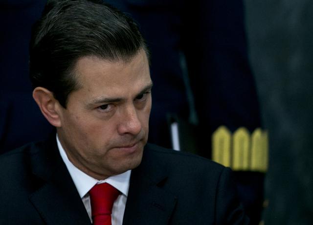 Mexico's President Enrique Pena Nieto pauses during a press conference at the Los Pinos presidential residence in Mexico City. (AP File Photo) Mexico's President Enrique Pena Nieto pauses during a press conference at the Los Pinos presidential residence in Mexico City. (AP File Photo)