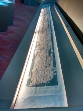 The 22-foot-long Peutinger scroll on the table (GRIST Media) The 22-foot-long Peutinger scroll on the table (GRIST Media)