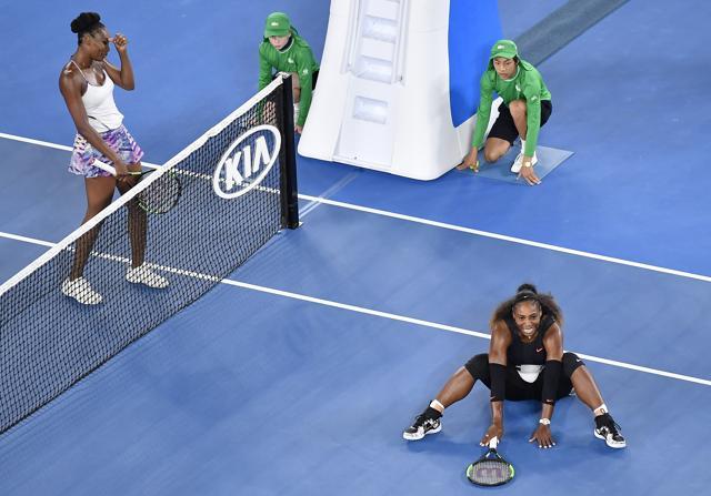 Serena Williams, right, celebrates after defeating her sister, Venus, left, in the women's singles final at the Australian Open tennis championships in Melbourne on Saturday. (AP) Serena Williams, right, celebrates after defeating her sister, Venus, left, in the women's singles final at the Australian Open tennis championships in Melbourne on Saturday. (AP)