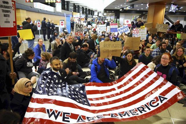 More than 1,000 people gather at Seattle-Tacoma International Airport to protest against President Donald Trump's order which restricts immigration to the US. (AP photo) More than 1,000 people gather at Seattle-Tacoma International Airport to protest against President Donald Trump's order which restricts immigration to the US. (AP photo)