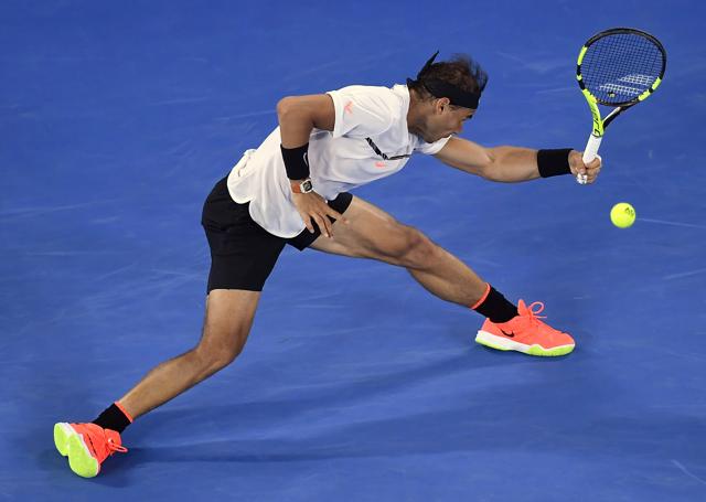 Spain's Rafael Nadal has been made to stretch by Roger Federer in the third set. (AP) Spain's Rafael Nadal has been made to stretch by Roger Federer in the third set. (AP)
