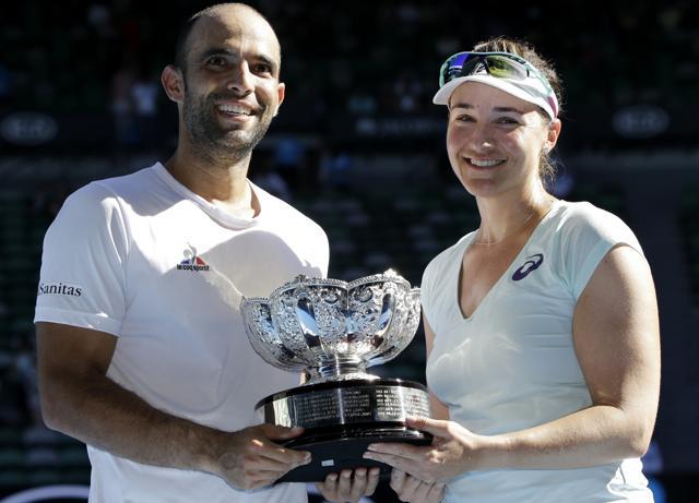 Abigail Speers of the US and Juan Sebastian Cabal of Colombia hold their trophy. (AP) Abigail Speers of the US and Juan Sebastian Cabal of Colombia hold their trophy. (AP)