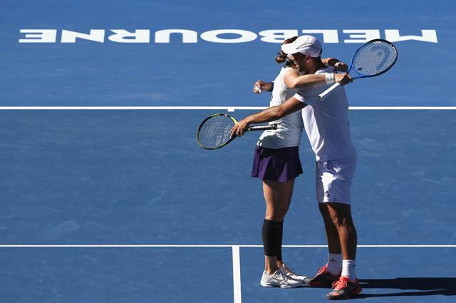Abigail Spears of the U.S. and Colombia's Juan Sebastian Cabal hug won the Mixed doubles final in straight sets. (REUTERS) Abigail Spears of the U.S. and Colombia's Juan Sebastian Cabal hug won the Mixed doubles final in straight sets. (REUTERS)