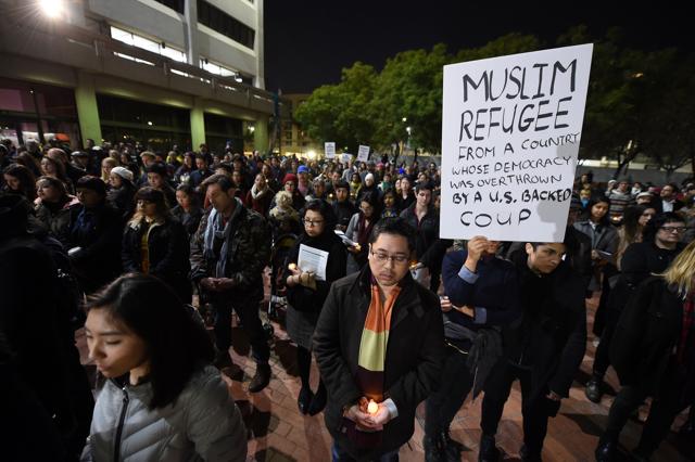People attend a rally and candlelight vigil in Los Angeles, California to protest against Islamophobia and US President Donald Trump's executive orders to curtail immigration. (AFP Photo) People attend a rally and candlelight vigil in Los Angeles, California to protest against Islamophobia and US President Donald Trump's executive orders to curtail immigration. (AFP Photo)