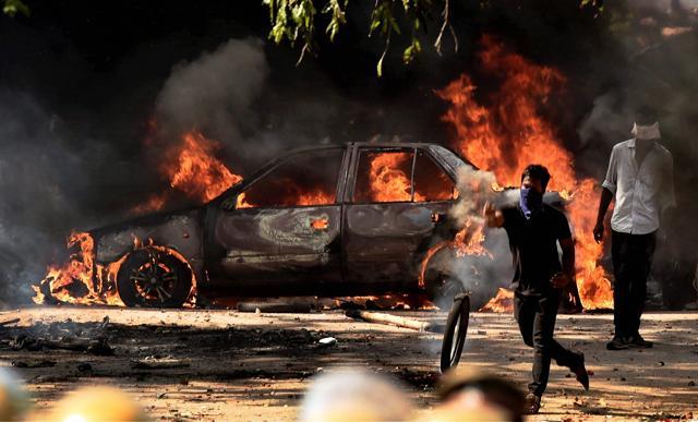 Pro-Jallikattu protesters during a violent clash with police near Chennai’s Marina beach. (PTI File) Pro-Jallikattu protesters during a violent clash with police near Chennai’s Marina beach. (PTI File)