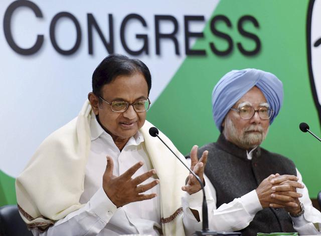 Former finance minister P Chidambaram and former Prime Minister Manmohan Singh speak to the media after releasing 'The Real State of Economy Report- 2017' in New Delhi on Monday. (PTI)
