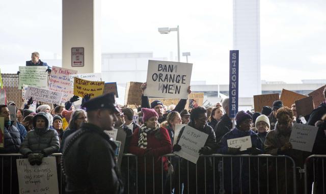 Demonstrators at Philadelphia International Airport protest against the executive order that President Donald Trump signed clamping down on refugee admissions and temporarily restricting travellers from seven predominantly Muslim countries on January 29, 2017 in Philadelphia, Pennsylvania. (AFP Photo) Demonstrators at Philadelphia International Airport protest against the executive order that President Donald Trump signed clamping down on refugee admissions and temporarily restricting travellers from seven predominantly Muslim countries on January 29, 2017 in Philadelphia, Pennsylvania. (AFP Photo)