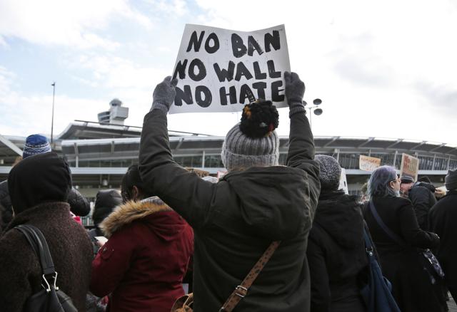 Protesters rally in front of John F Kennedy International Airport in New York. (AP Photo) Protesters rally in front of John F Kennedy International Airport in New York. (AP Photo)