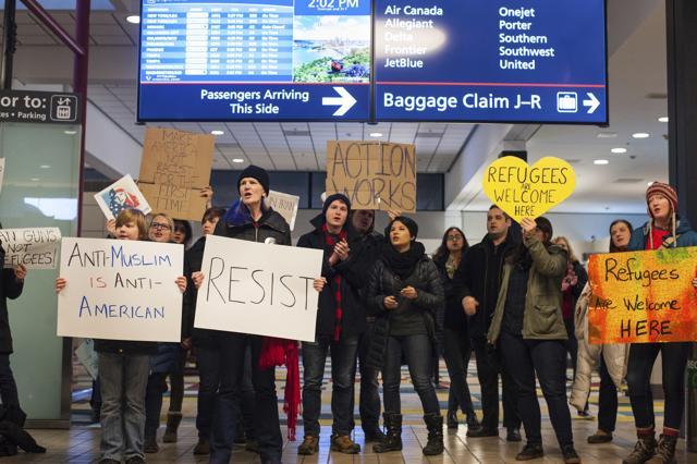 People chant ‘No hate, no fear. Everyone is welcome here,’ as they protest against President Donald Trump's travel ban on refugees and citizens of seven Muslim-majority nations, at Pittsburgh International Airport. (AP photo) People chant ‘No hate, no fear. Everyone is welcome here,’ as they protest against President Donald Trump's travel ban on refugees and citizens of seven Muslim-majority nations, at Pittsburgh International Airport. (AP photo)