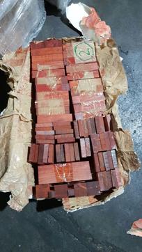 The DRI seized red sanders concealed in 26 jumbo bags of iron bauxite. (HT PHOTO) The DRI seized red sanders concealed in 26 jumbo bags of iron bauxite. (HT PHOTO)