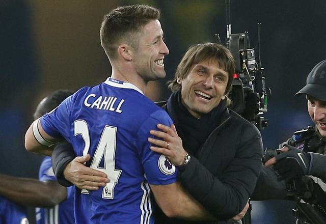 Chelsea manager Antonio Conte with defender Gary Cahill. (REUTERS) Chelsea manager Antonio Conte with defender Gary Cahill. (REUTERS)