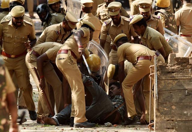 Riot control police take away a pro-Jallikattu protester during a clash at Chennai’s Marina beach. (PTI File) Riot control police take away a pro-Jallikattu protester during a clash at Chennai’s Marina beach. (PTI File)