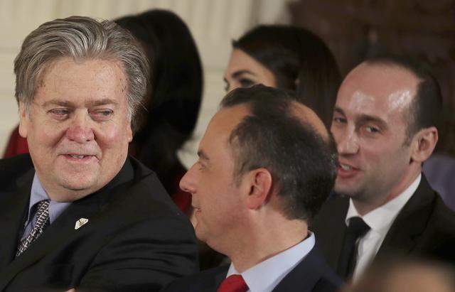 Chief White House strategist Steve Bannon (L) sits with Chief of Staff Reince Priebus (C) and senior advisor Stephen Miller during a swearing-in ceremony at the White House in Washington. (Reuters Photo) Chief White House strategist Steve Bannon (L) sits with Chief of Staff Reince Priebus (C) and senior advisor Stephen Miller during a swearing-in ceremony at the White House in Washington. (Reuters Photo)