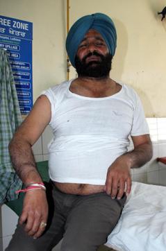Injured photo journalist at the local civil hospital. (Jagtinder Singh Grewal / HT Photo) Injured photo journalist at the local civil hospital. (Jagtinder Singh Grewal / HT Photo)