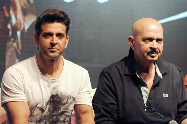 Indian Bollywood actor Hrithik Roshan (L) and his father Rakesh Roshan pose during the song launch of their upcoming Hindi film Kaabil directed by Sanjay Gupta and produced by Rakesh Roshan in Mumbai. (AFP)