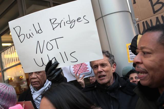 Several hundred demonstrators protest President Donald Trump's executive order which imposes a freeze on admitting refugees into the United States. (AFP Photo) Several hundred demonstrators protest President Donald Trump's executive order which imposes a freeze on admitting refugees into the United States. (AFP Photo)