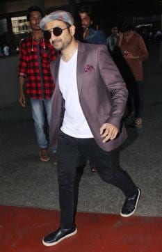 Vir Das sporting a white T shirt, and a classic herringbone cap. Vir Das sporting a white T shirt, and a classic herringbone cap.