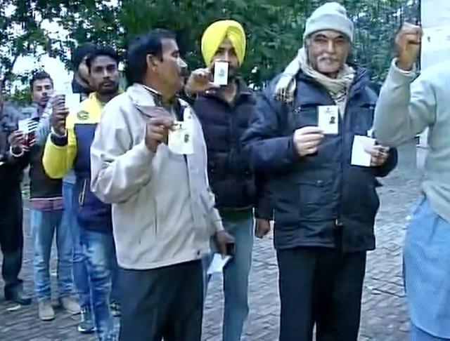 At polling booth no.123-124 at SD College in Pathankot (Twitter/@ANI_News) At polling booth no.123-124 at SD College in Pathankot (Twitter/@ANI_News)